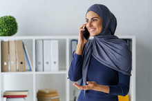 Muslim Woman Talking On Phone