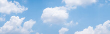 Blue Sky Background With White Clouds During Day . Panorama .