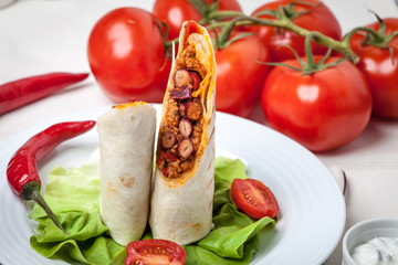 Canvas Print - Burritos filled wiht minced meat, bean and vegetables.