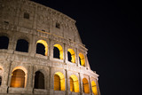 Fototapeta  - Colloseum at night - Roman Heritage Rome Italy