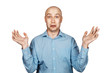 © vika33 - Portrait bald unsure man doesn't understand anything and spreads his hands. guy in a blue shirt on white isolated background in perplexity