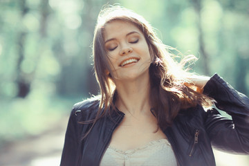 Wall Mural - Spring portrait of young beautiful brunette