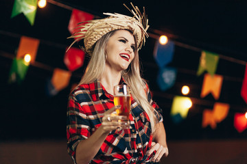 Brazilian woman wearing typical clothes for the Festa Junina - June festival