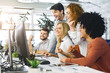 © Prostock-studio - Millennials enjoying great results on computer screen