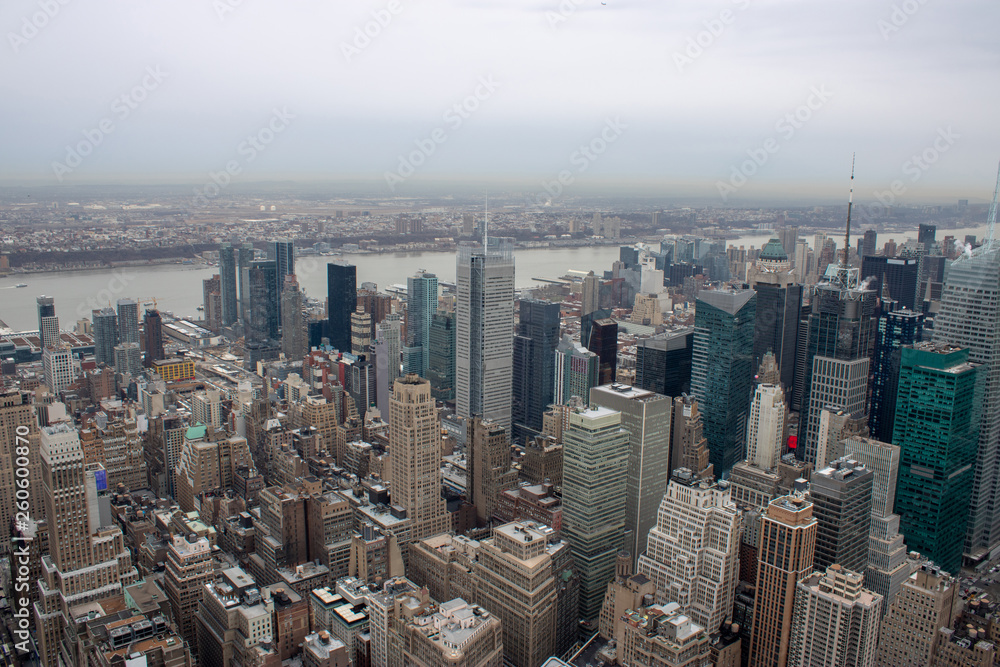 Aerial view of Manhattan in New York City showing the classic high rise ...