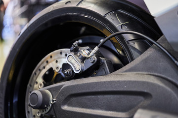 The rear wheel of a modern motorcycle