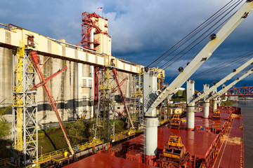 Bulk carrier alongside grain terminal at Columbia river in Portland, Oregon