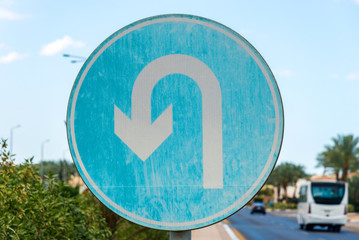 blue road sign reversal full frame