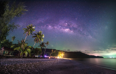 Wall Mural - milky way galaxy, on ao prao, koh kood trat, thailand,long exposure photograph, with grain.image con