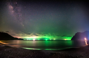 Wall Mural - milky way galaxy, on ao prao, koh kood trat, thailand,long exposure photograph, with grain.image con
