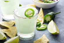 Salted Rim Spicy Iced Margarita With Jalapeno, Limes And Chips