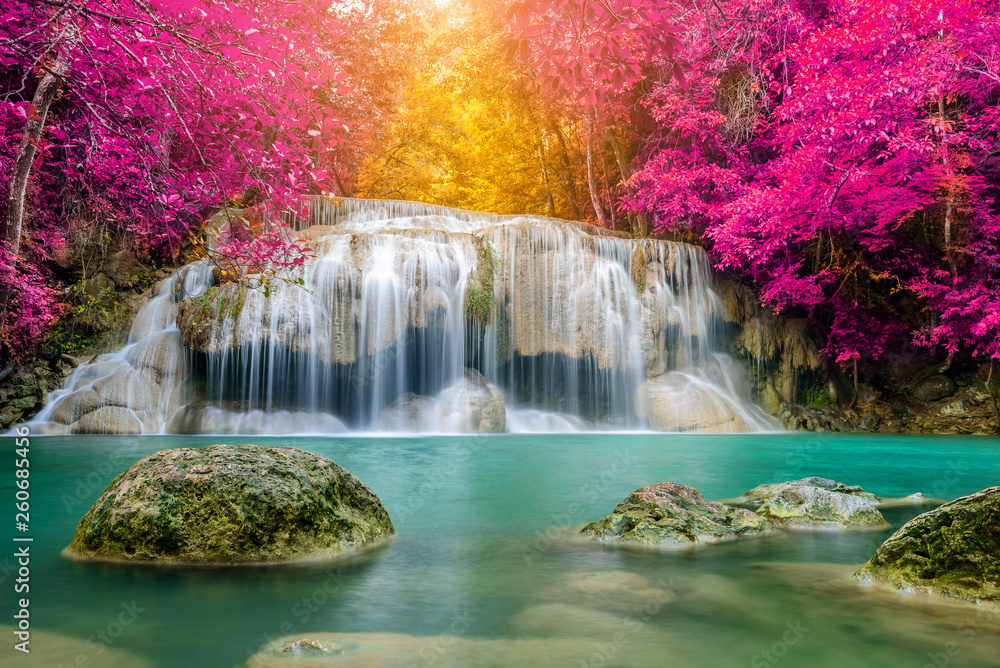 Amazing in nature, beautiful waterfall at colorful autumn forest in fall season - obrazy, fototapety, plakaty 