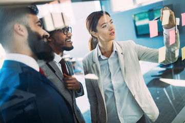 Businesspeople discussing together in conference room during meeting at office