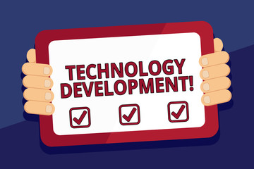 writing note showing technology development. business concept for anything in regards to inventions 
