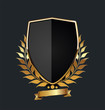 © totallyout - Golden shield with golden laurel wreath