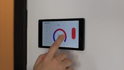 Wall Mural - Smart home climate control device on a wall