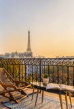 Fototapeta Boho - beautiful paris balcony at sunset with eiffel tower view 
