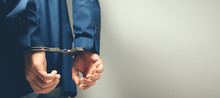 Man Hand Handcuffs In Back