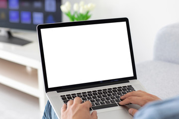 male hands on keyboard laptop with isolated screen in room