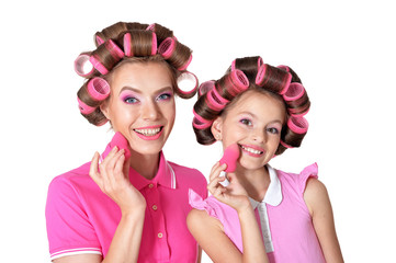 Sticker - Portrait of mother and little daughter in hair curlers