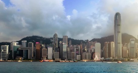Fototapete - Hong Kong skyline in the evening over Victoria Harbour