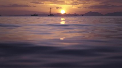 Sticker - slow motion water of tropical sea, bokeh