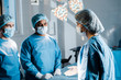 © LIGHTFIELD STUDIOS - selective focus of doctors and nurse in uniforms and medical masks talking
