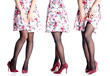 Set female legs in black stockings and red high heel shoes on white background. Isolation