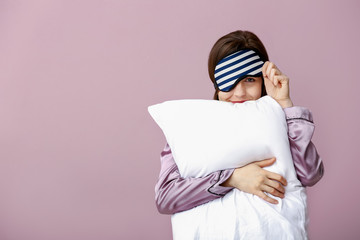 Sticker - Sleepy woman with mask and pillow on color background