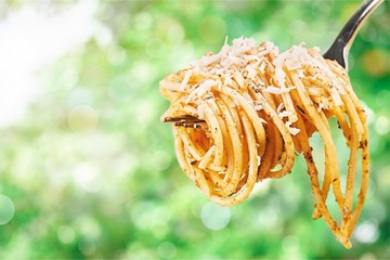 Canvas Print - Fork with just spaghetti around it on backgrouund