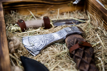 Axe texture close up. A  handmade  forged axe. High contrast and shallow depth of field