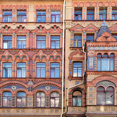  windows and details on an exterior of the building.