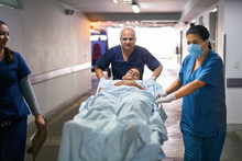 Medical Emergency With Ambulance Staff