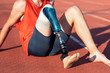 © Santi Nunez/Stocksy - Portrait of disabled man athlete with leg prosthesis