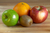Fototapeta  - Orange, kiwi fruit and two apples