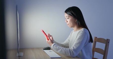 Canvas Print - Woman use of computer and cellphone at home in the evening