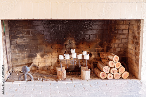 Candles And Logs In A Fireplace Buy This Stock Photo And Explore