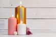 home lighting candles on wooden table