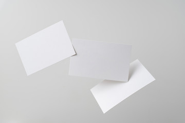 Wall Mural - front view of white business card on white