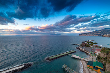 Wall Mural - Evening on Mediterranean sea at Sorrento city in Italy.