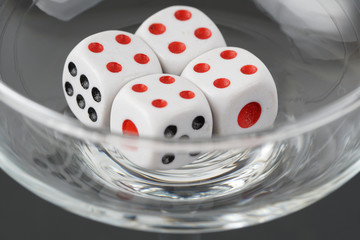 a dice in a glass