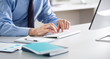 © chagin - Close-up of hands senior businessman working with computer