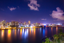 Beautiful Condado Beach, San Juan Puerto Rico Seen At Night With Bay, Buildings And Lights