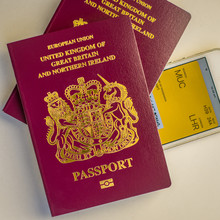 British Passports And Electronic Boarding Pass On Smartphone