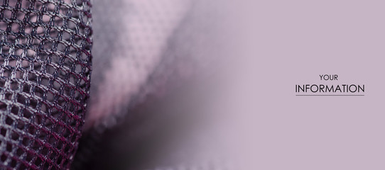 Black mesh lining fabric textile material cloth macro pattern on blur background
