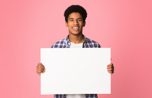 Happy Guy Showing Blank Placard With Copy Space For Your Text