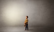 © ra2 studio - Little waggish kid staying alone in a big empty room with his plush