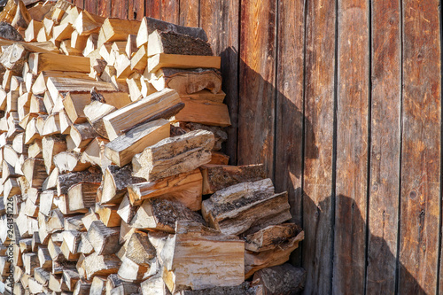 Pile Of Firewood Prepared To Fireplace For The Winter And Use For