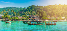 Tonsai Beach Bay With Traditional Longtail Boats Parking In Phi Phi Island, Krabi Province, Andaman Sea,  Thailand