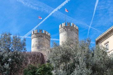 The Walls of Genoa - The Gate Porta Soprana with flags, Italy